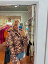 The Lady in Leopard Puffer Jacket