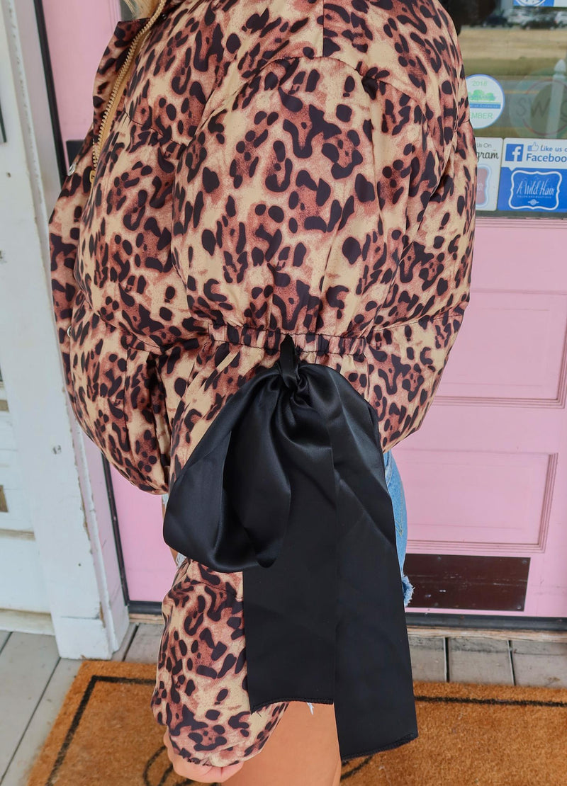 The Lady in Leopard Puffer Jacket